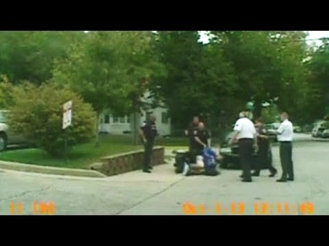 Shocking CCTV Police push over man in wheelchair